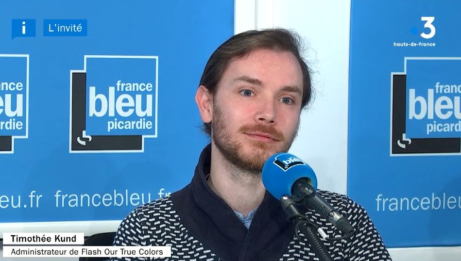 Un militant de Flash Our True Colors en interview à France Bleu